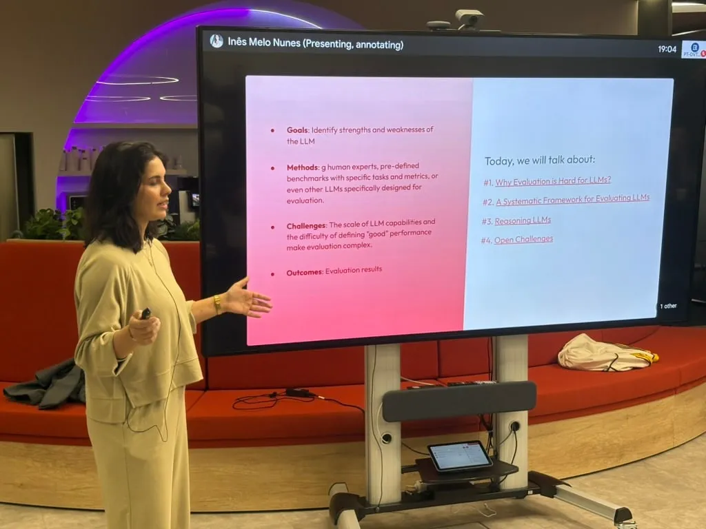 A speaker presenting a framework for evaluating LLMs