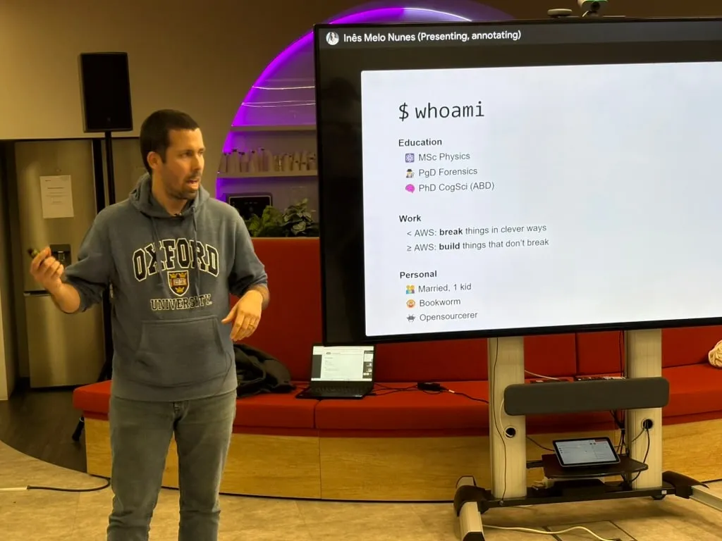 A speaker introducing a talk on red-teaming generative AI applications